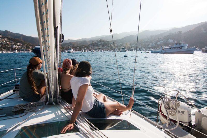 Family sailing together on a sailboat