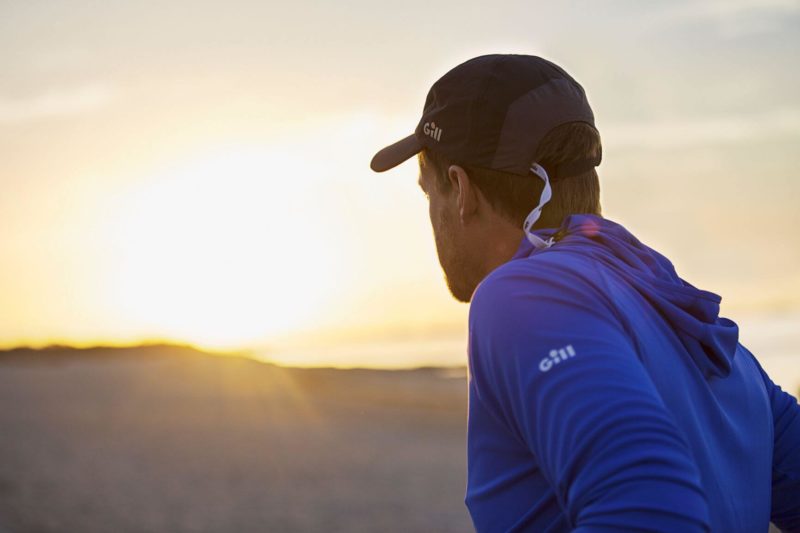 Man wearing UV Cap during Sunset