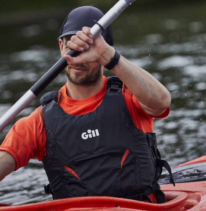 Man kayaking wearing the Pro Racer Bouyancy Aid