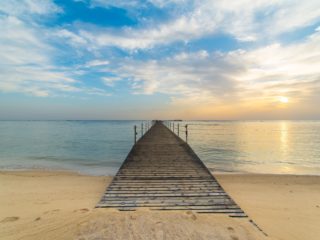 Photo of Hurghada beach. Brigde sprawling out over the Red Sea.
