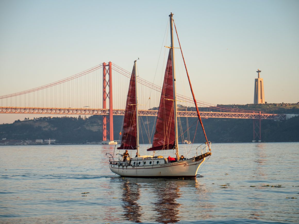 Gulet, a traditional type of boat from Turkey with two masts and wooden deck, sailing in Lisbon