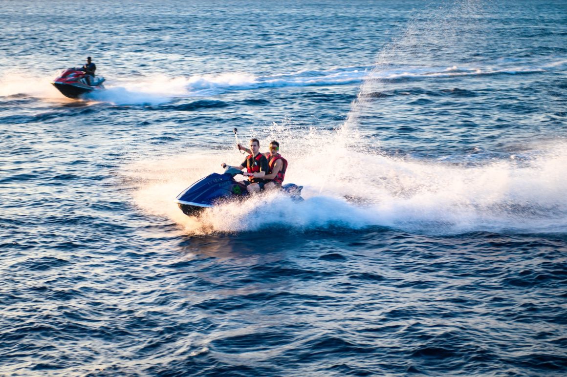 Jet ski, type of boat which accelerates quickly, crashing along the waves 