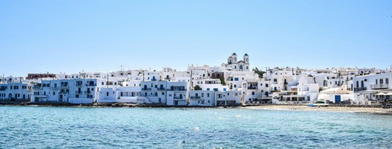 Image of waterfront white buildings