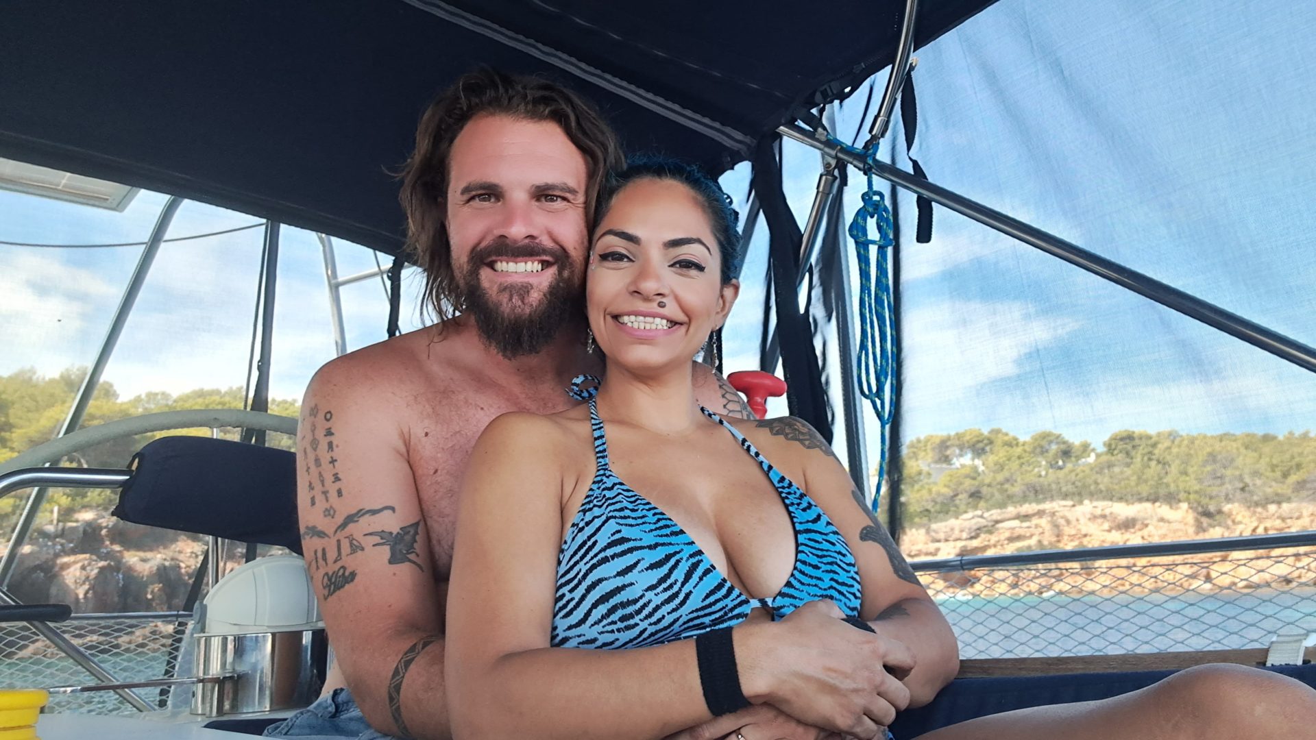 Picture of Andrew and his wife, Hiba, on their sailboat