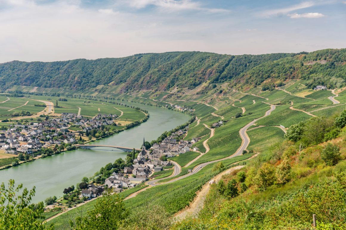 The winding Moselle River surrounded by steep vineyards and villages.