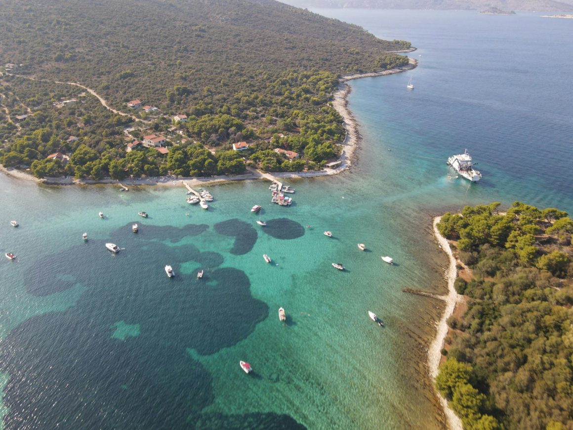 Aerial view of turquoise waters and boats at the Blue Lagoon.