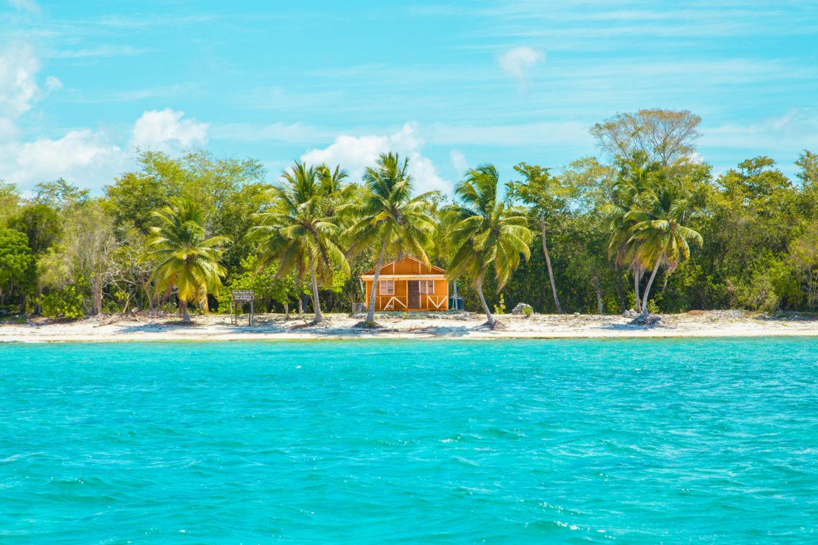 Orange hut on tropical beach.