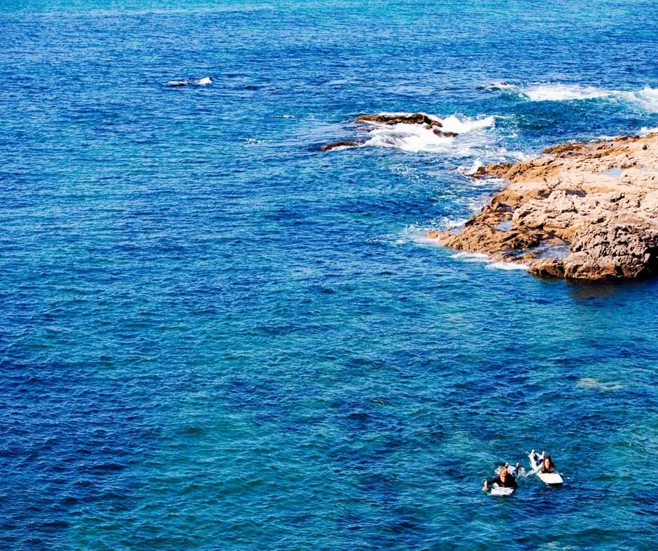Haga paddle surf durante tu alquiler de barco en Menorca