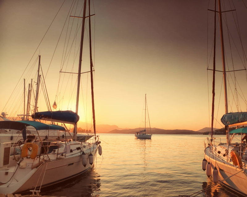 Three Sailboats During Sunset