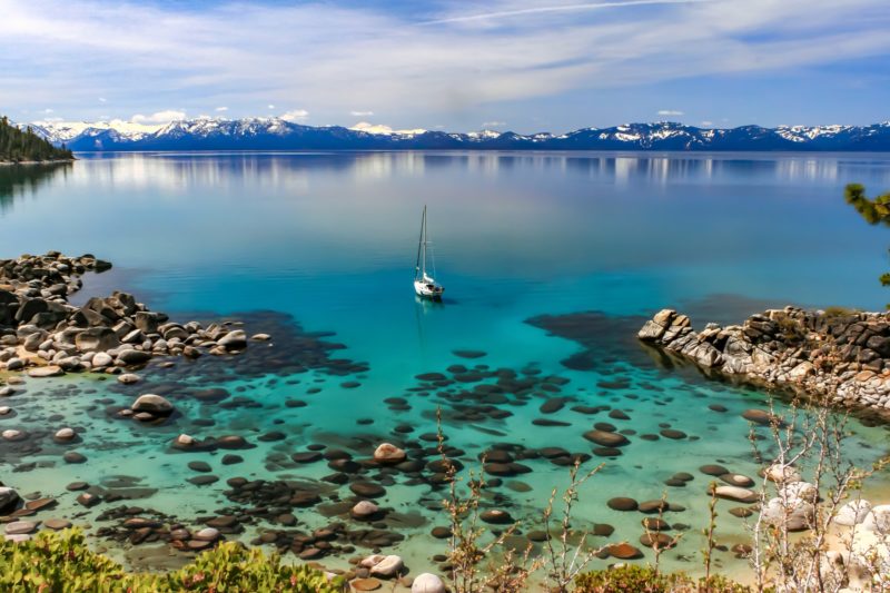 Sailboat in the middle of Lake Tahoe