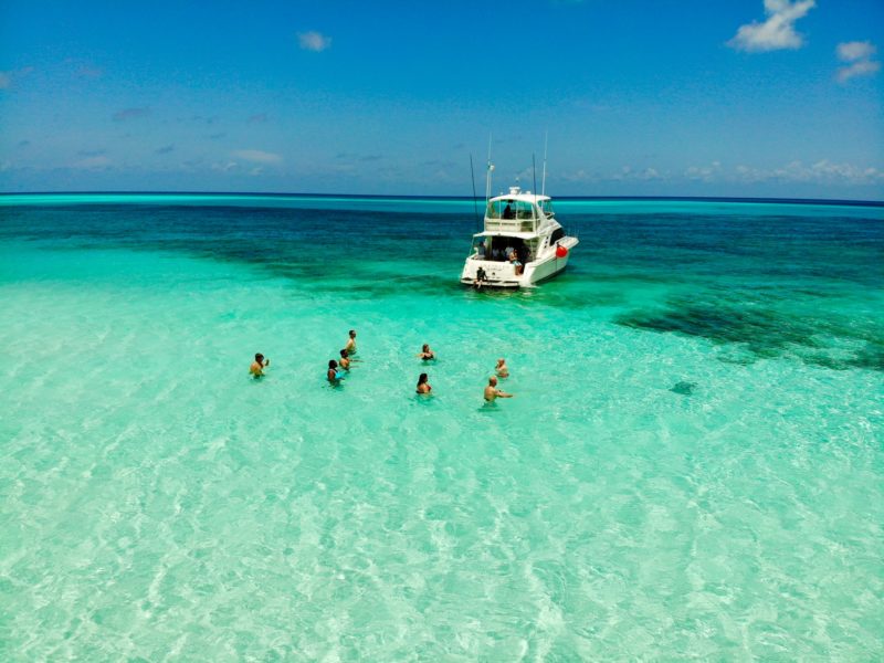 People enjoying swimming in El Cozumel