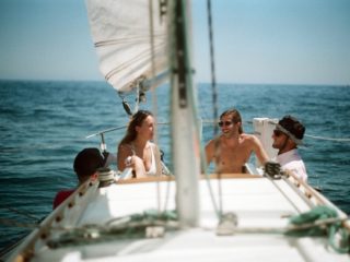 Group of friends on a sailboat