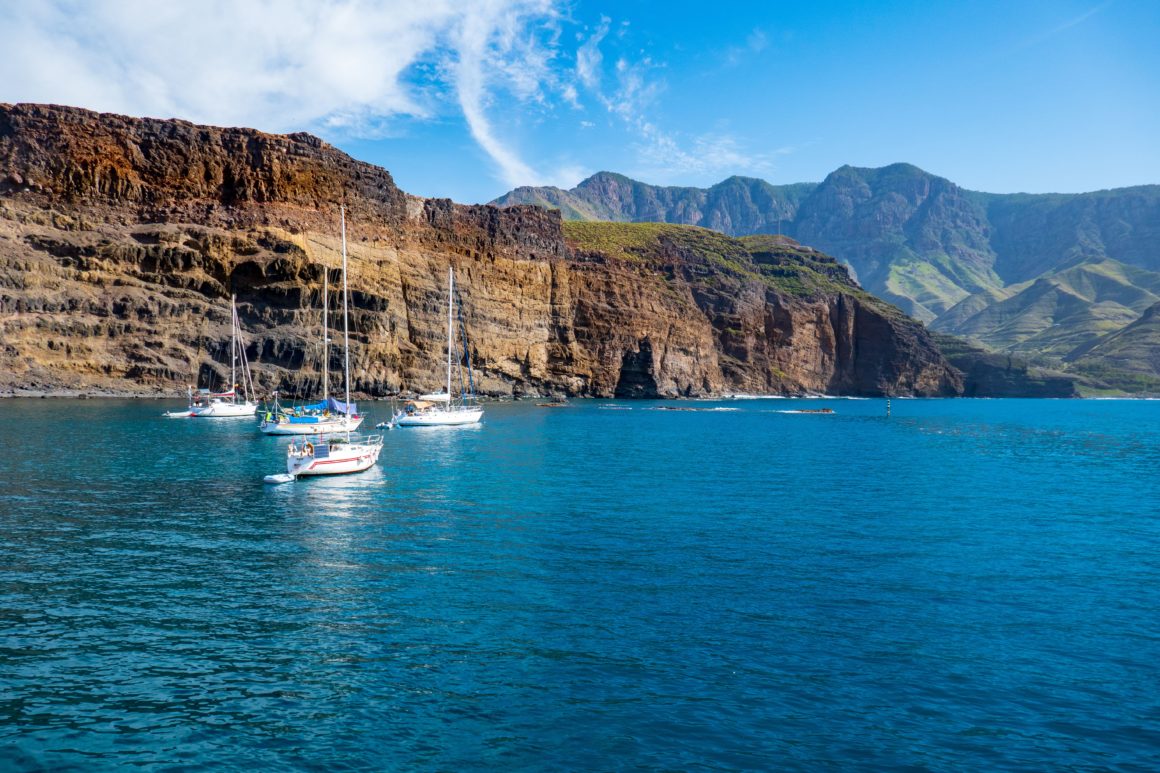 Sailboats off of the Gran Canaria landscape