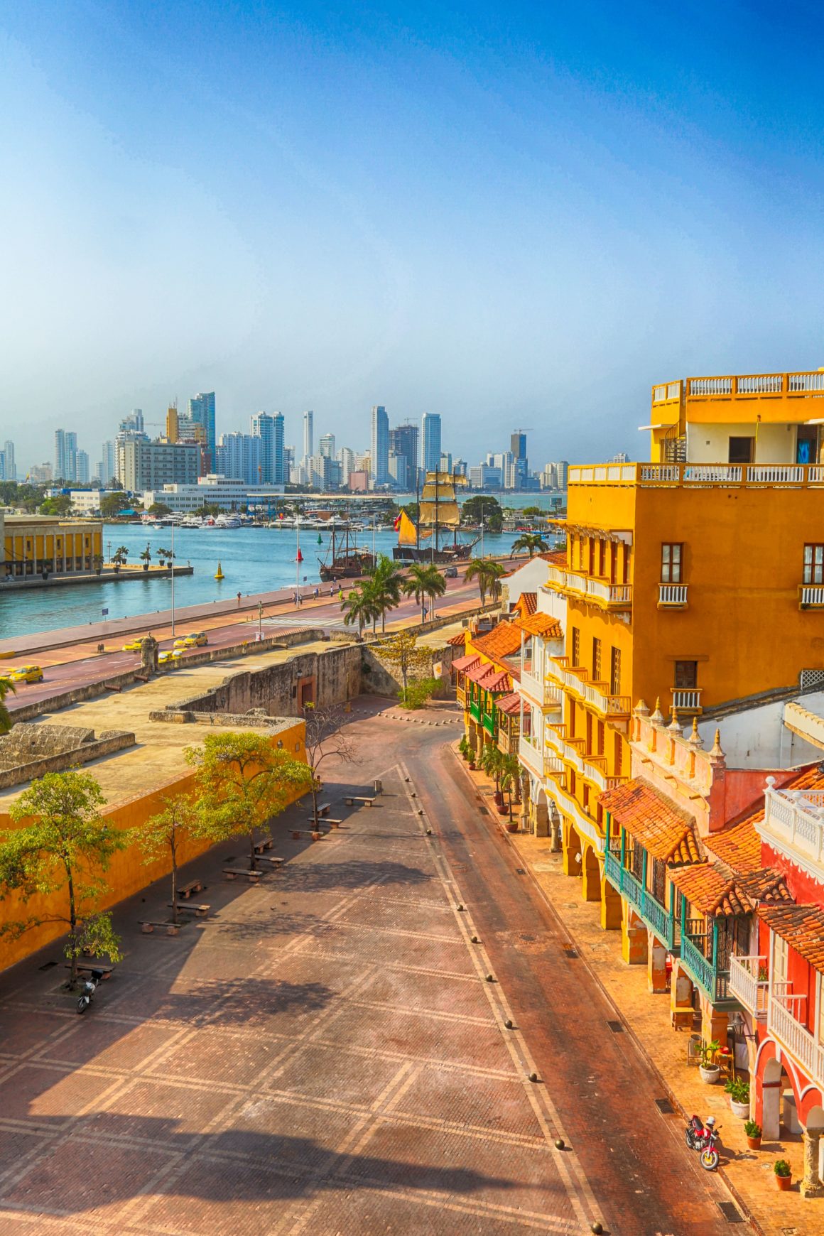 Colorful Cartagena city skyline and palm tree-lined coast