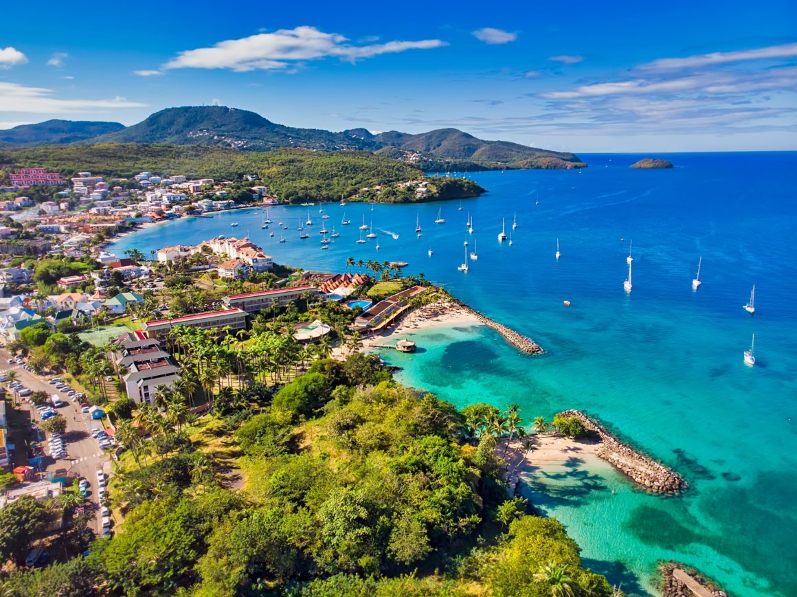 Caribbean Coast with sailboats and blue ocean