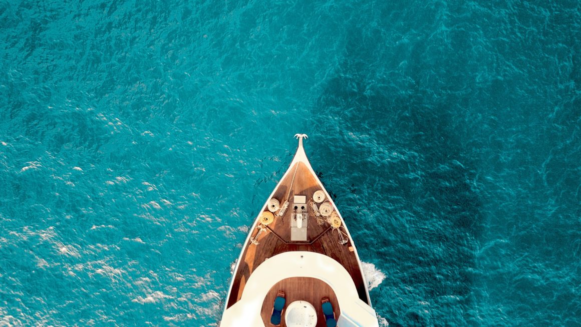 Sailing Yacht in clear blue waters in the Maldives