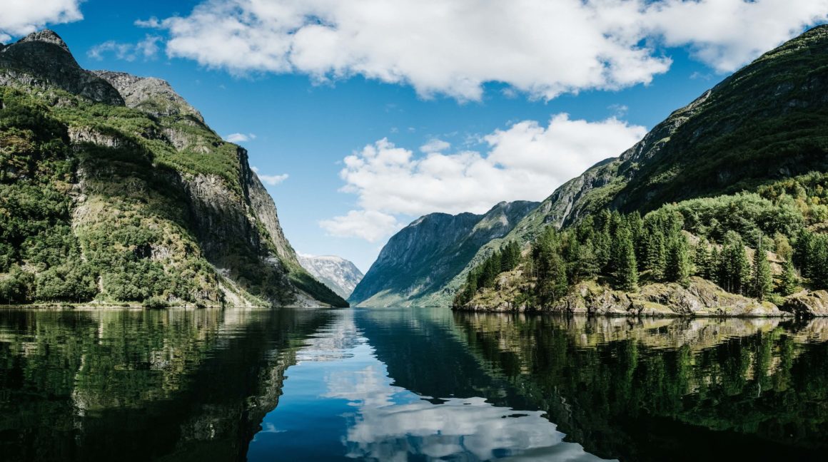 A fjord with green cliffs in Norway