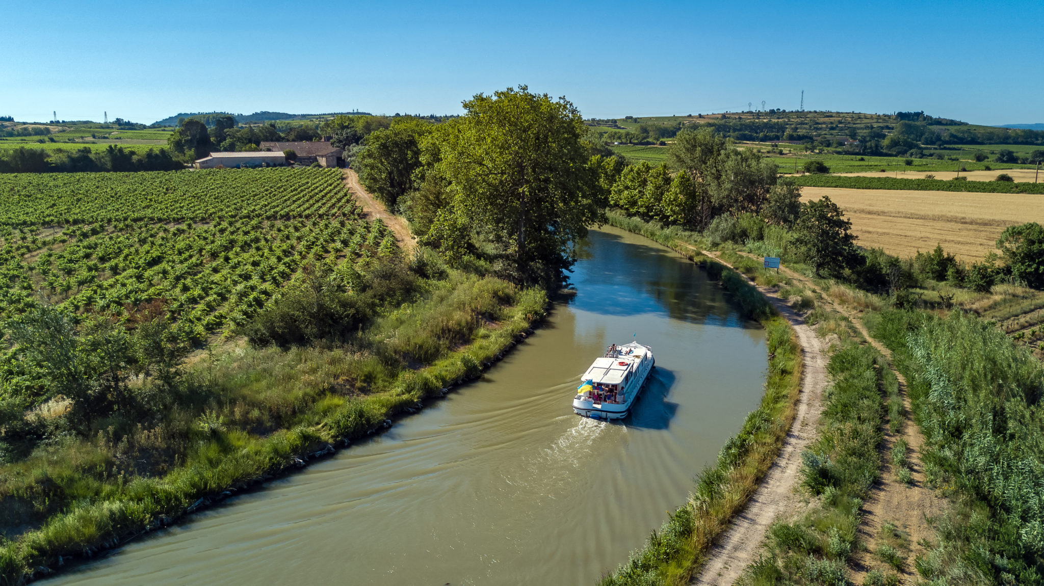 Aerial Top View Of Boat In Canal Du Midi From Above, Family Travel By 